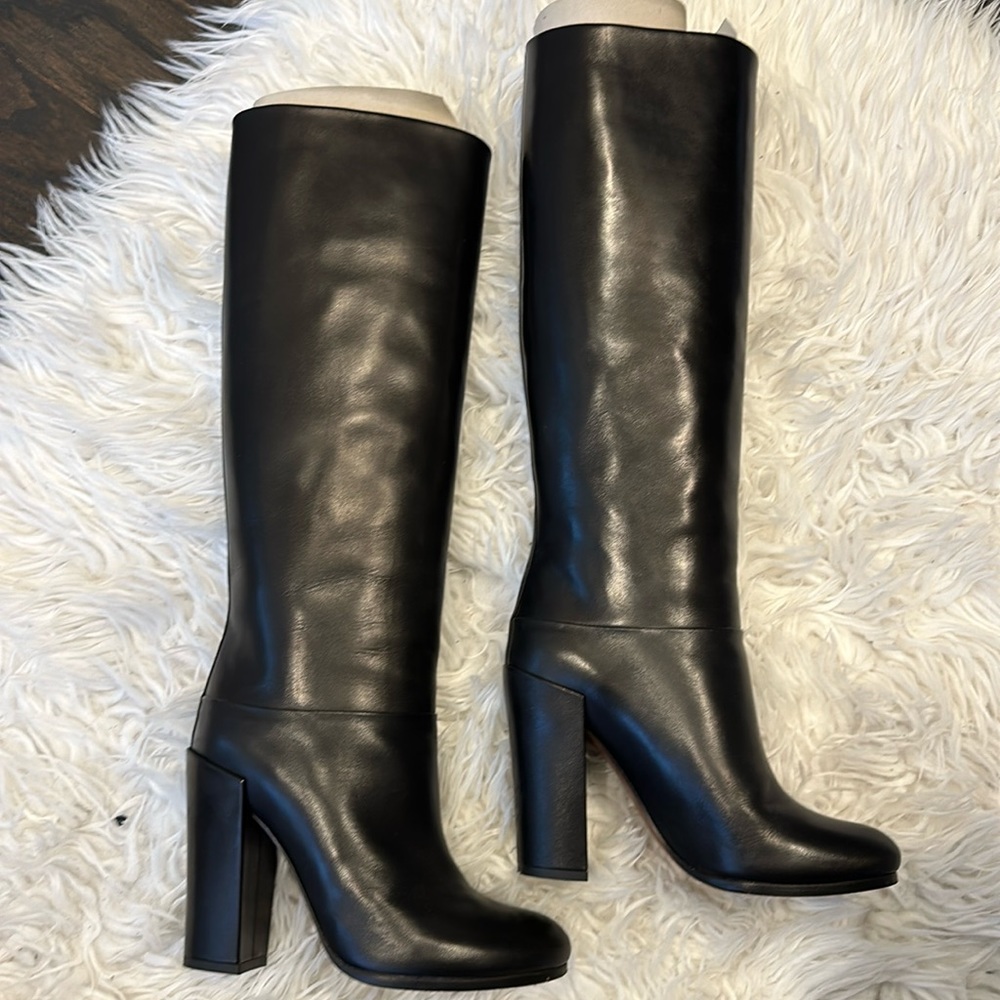 Stylish high boots heels, 37.5 size. Black leather bootd